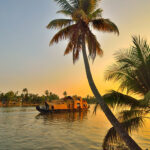 Houseboat in kerala backwaters during sunset